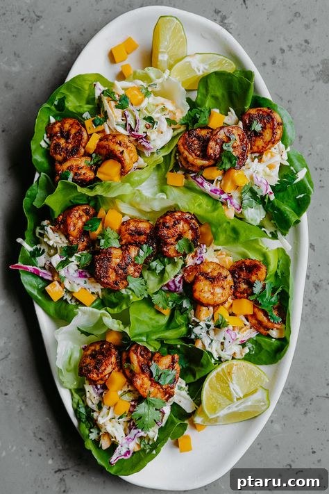 20+ Guilt-Free Shrimp Recipes for Dinner: Absolutely Delicious! 17 Shrimp and Mango Lettuce Wraps, fresh and vibrant.