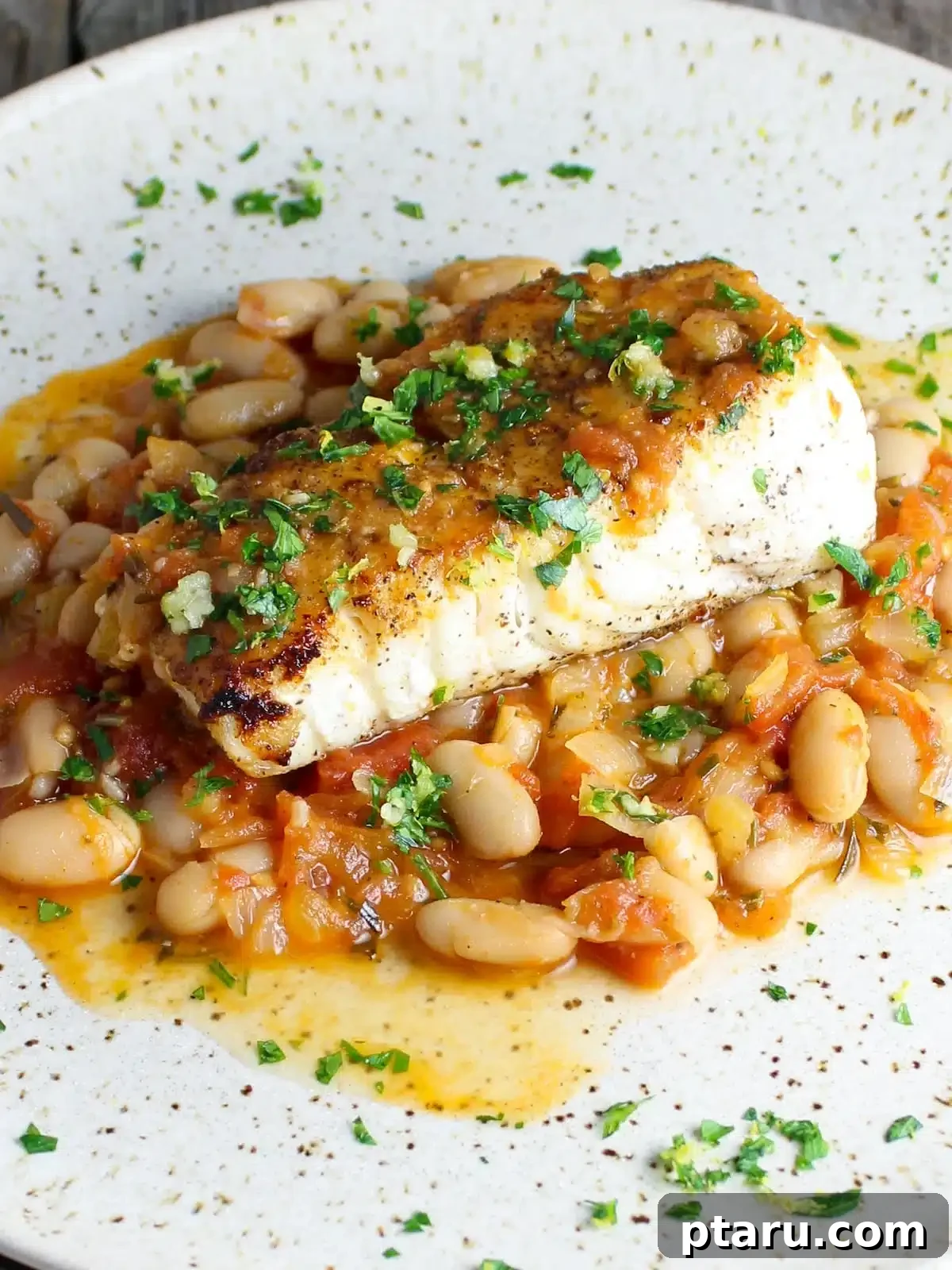 Halibut Perfection: Top Online Recipes 21 Pan-fried halibut served with white beans and gremolata.