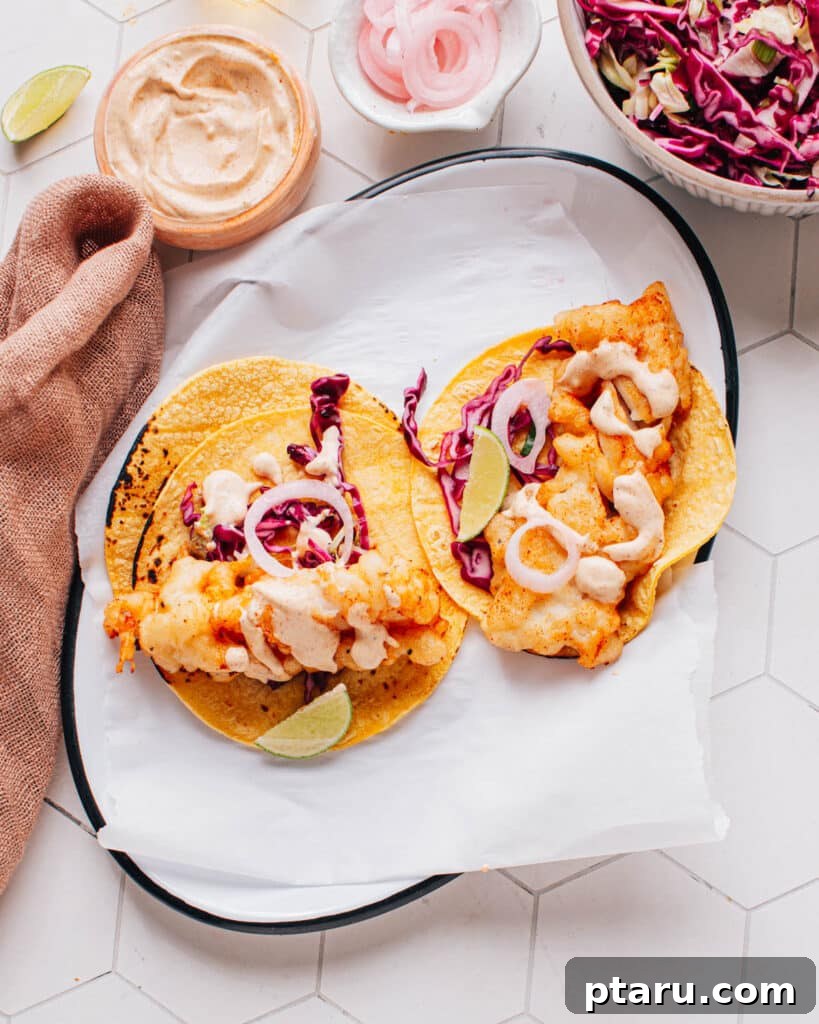 Halibut Perfection: Top Online Recipes 4 A platter of crispy Baja fish tacos, garnished with lime and cilantro.