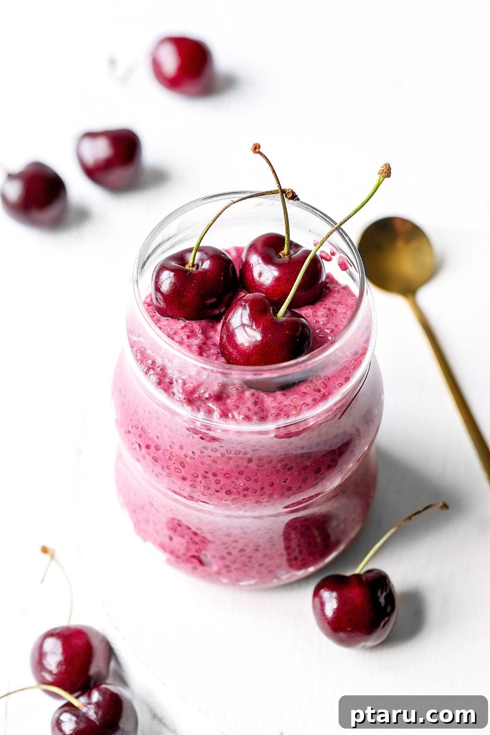Decadent Gluten and Dairy Free Treats 11 Bright pink dairy-free raspberry chia seed pudding in a glass jar