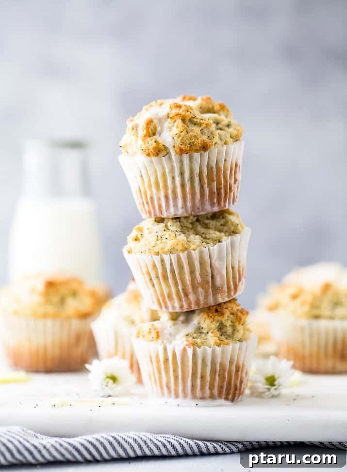 Decadent Gluten and Dairy Free Treats 17 Golden brown gluten-free lemon poppy seed muffins with a lemon glaze