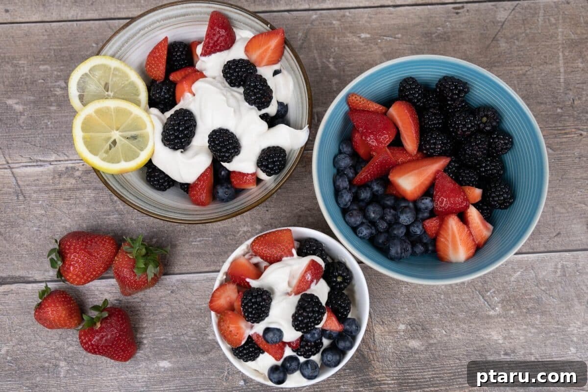 Decadent Gluten and Dairy Free Treats 3 Vibrant berry fruit salad topped with fluffy whipped coconut cream