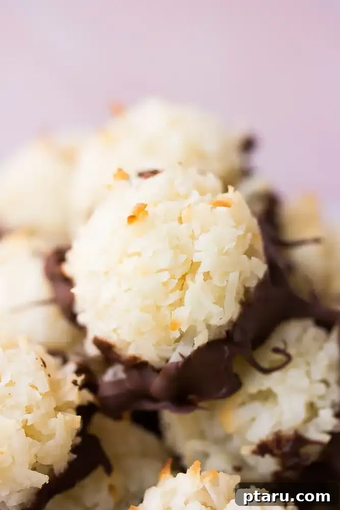 Decadent Gluten and Dairy Free Treats 22 Golden-brown vegan coconut macaroons, some dipped in chocolate