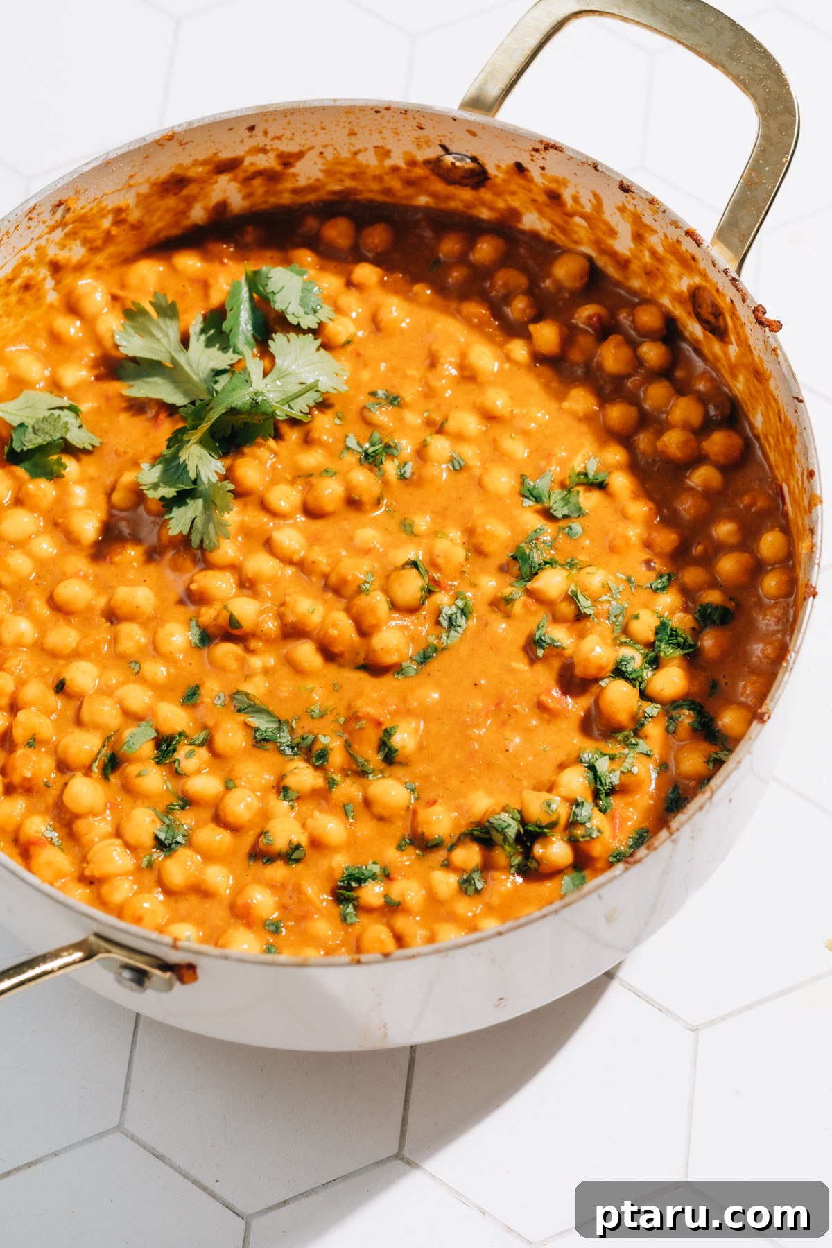 Speedy Coconut Chickpea Curry 7 A large pot of creamy curry chickpeas, ready to be served family style.
