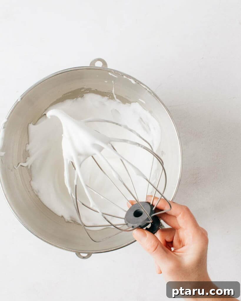 Festive Buche de Noel Yule Log 3 Egg whites beaten to medium stiff peaks for Buche de Noel