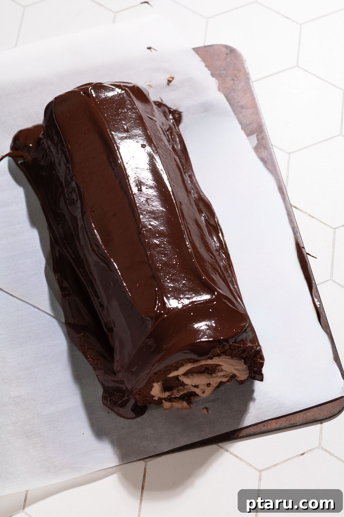 Festive Buche de Noel Yule Log 10 Decorating the Buche de Noel with a fork to create bark texture