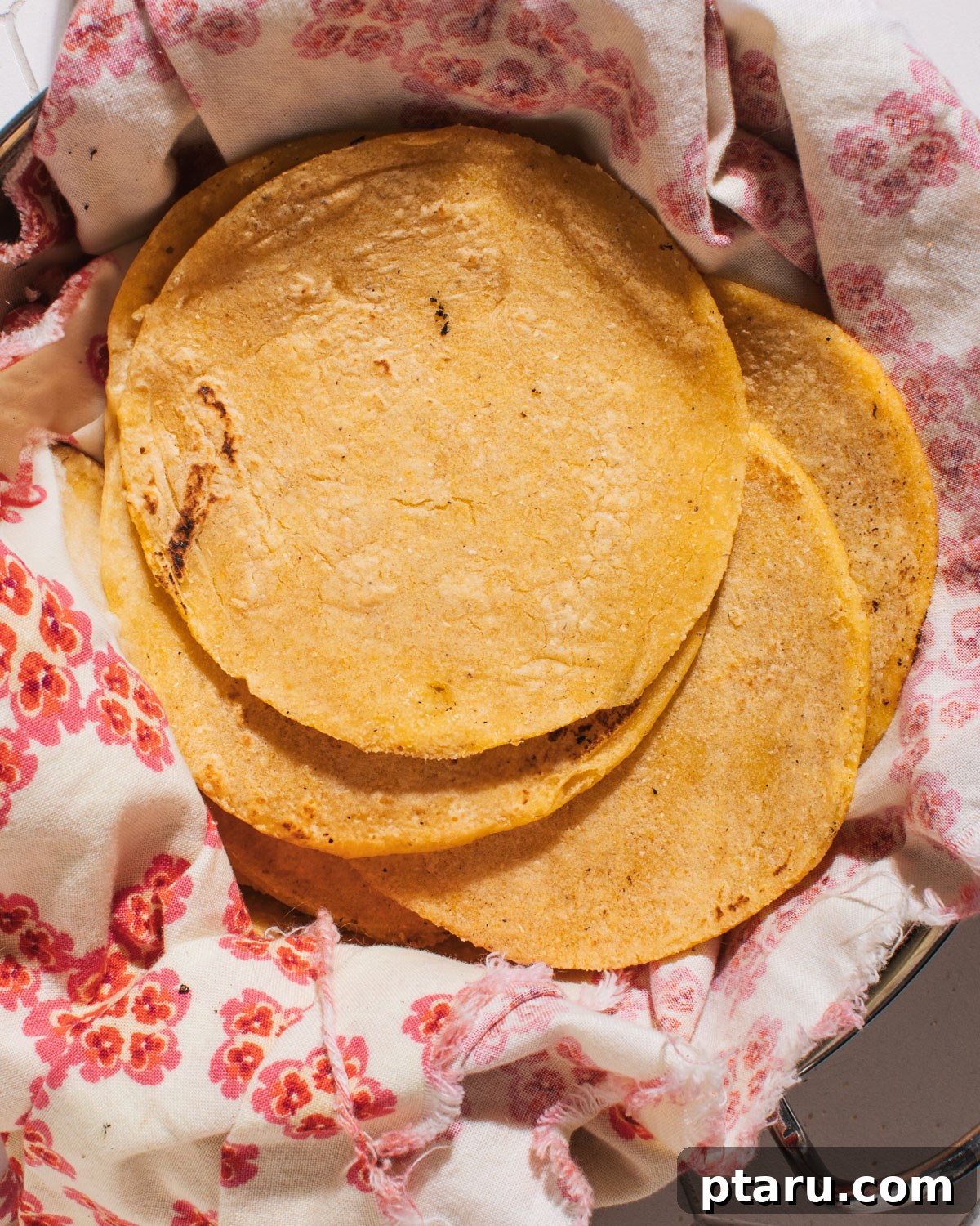 Perfectly Soft Homemade Corn Tortillas Made Easy 2 Freshly made soft homemade corn tortillas stacked, ready to be served for a delicious meal