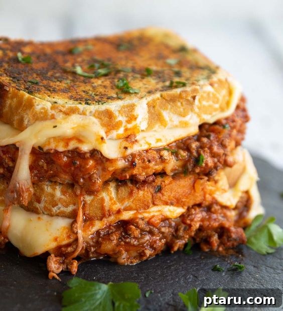 26 Hearty Meat Sauce Recipes: Delicious Dinners and Easy Leftovers 4 Bolognese Grilled Cheese sandwich, oozing with cheese and sauce.