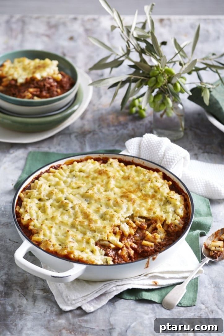 26 Hearty Meat Sauce Recipes: Delicious Dinners and Easy Leftovers 6 Bolognese Mac and Cheese, a cheesy pasta dish with meat sauce.