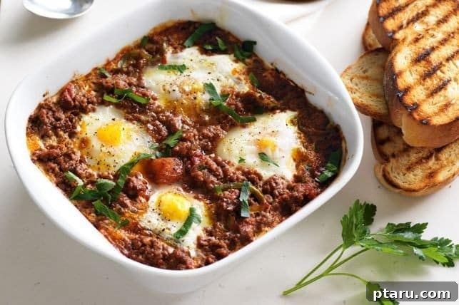 26 Hearty Meat Sauce Recipes: Delicious Dinners and Easy Leftovers 9 Baked Eggs in Meat Sauce, a hearty breakfast or brunch.