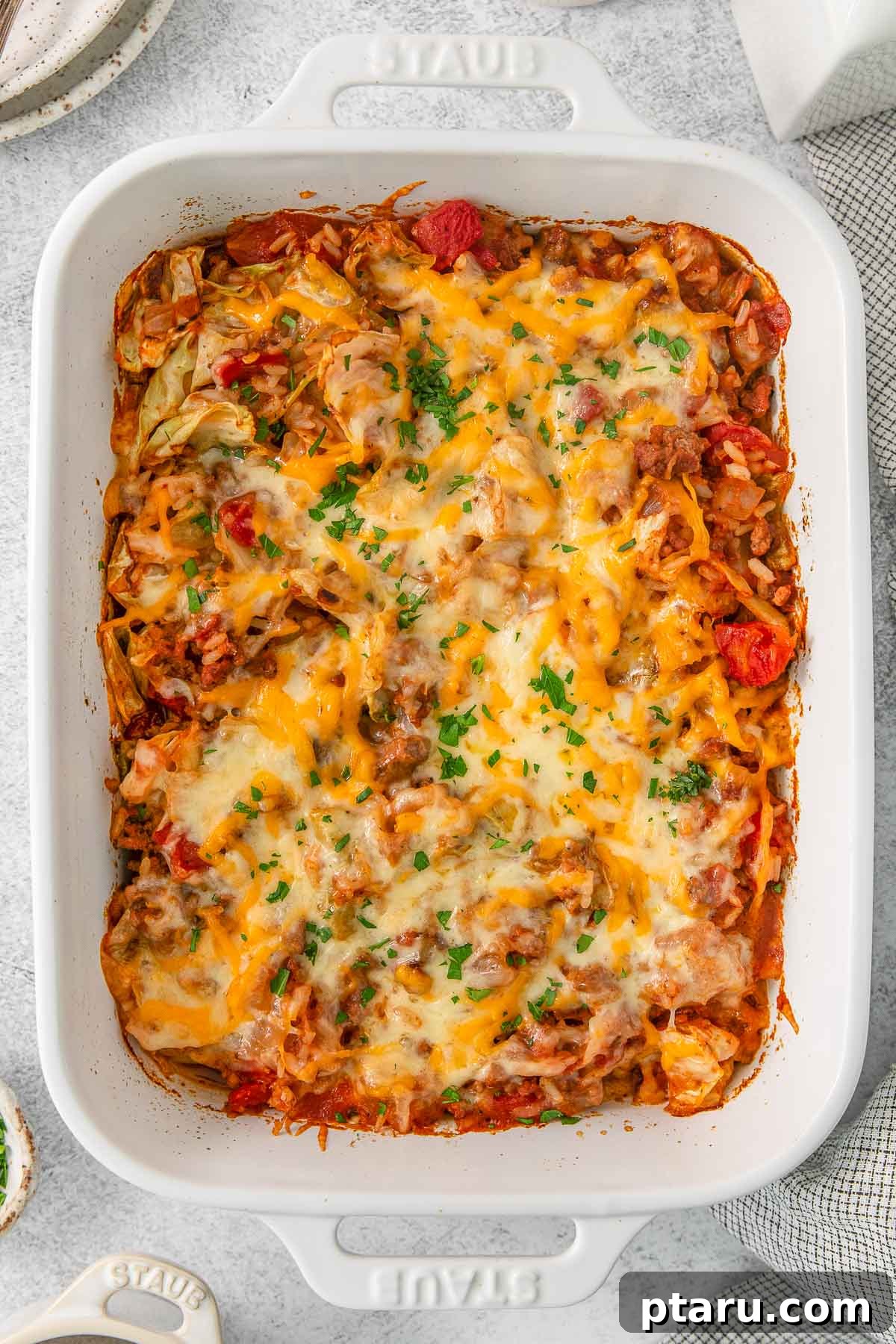 The Ultimate Ground Beef and Cabbage Recipe Collection 5 A bubbling Cabbage and Beef Casserole fresh from the oven, with golden cheese.