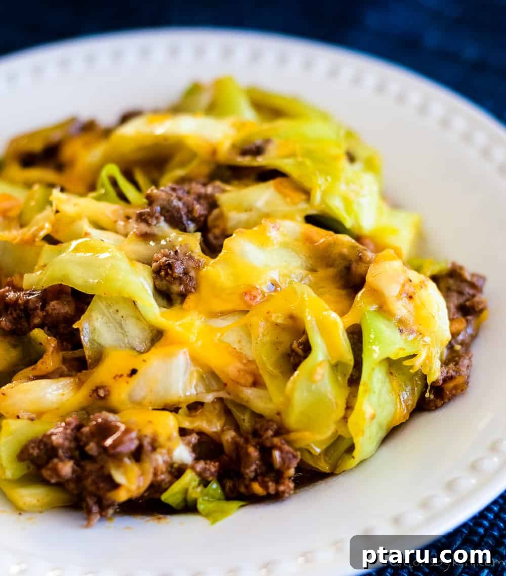 The Ultimate Ground Beef and Cabbage Recipe Collection 9 Delicious Beef and Cabbage Tacos arranged on a plate with fresh toppings.