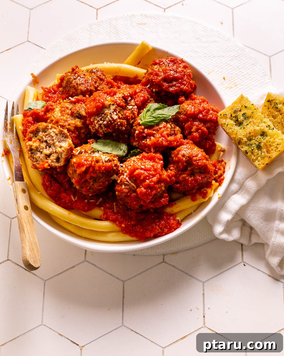 Homemade Garlic Bread That Outshines Restaurants 6 Best Meatball Recipe served alongside fresh homemade garlic bread, illustrating a perfect pairing.