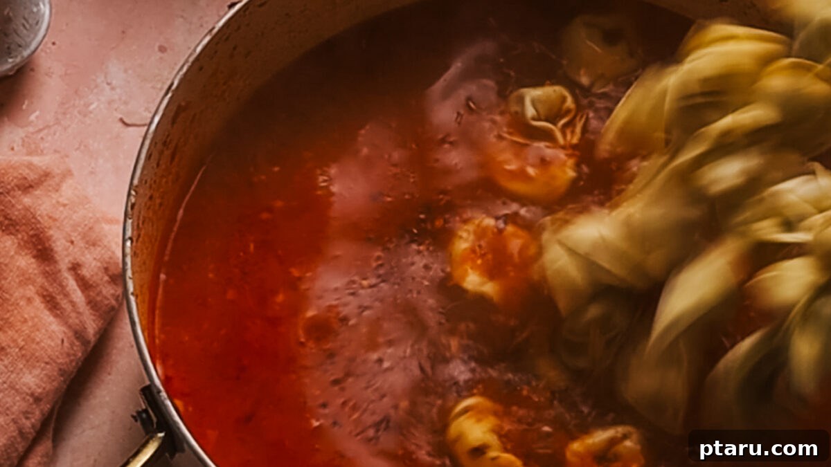 30 Minute One Pot Creamy Tortellini Soup 7 Step 4: Fresh tortellini added to the simmering soup.