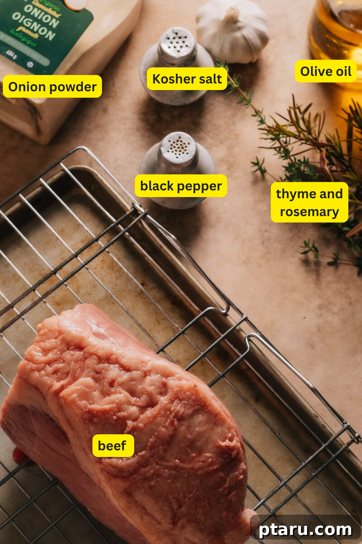Melt-in-Your-Mouth Eye of Round Roast 3 Collection of fresh ingredients for Eye of Round Roast including herbs, garlic, and seasoning.