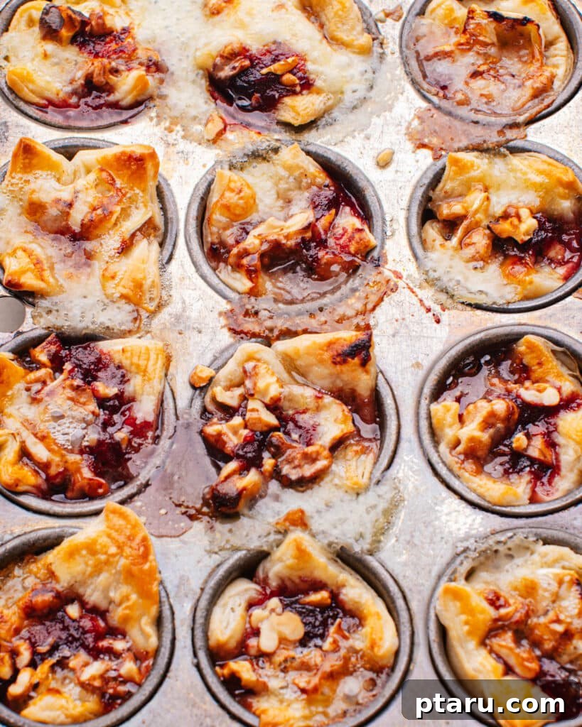 Over 40 Easy Christmas Bites Your Guests Will Devour 2 Baked Brie Appetizer in Mini Muffin Tin