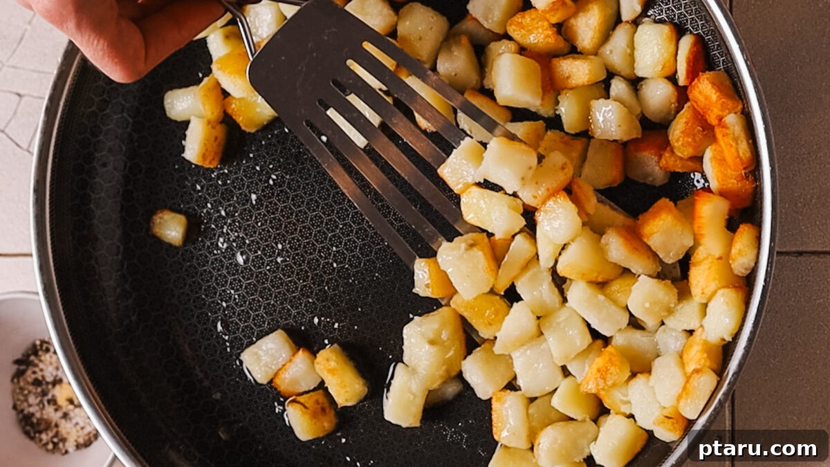 Crispy Fluffy French Fries 7 Sautéing potatoes in the pan