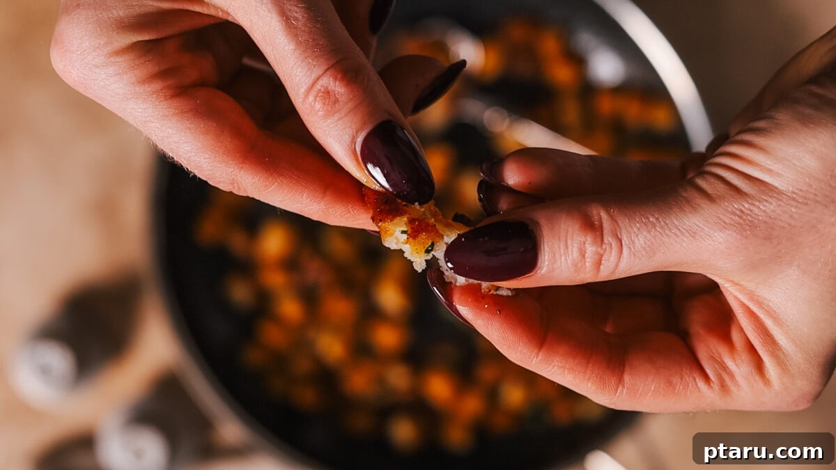 Crispy Fluffy French Fries 8 Checking fried potato for crispness