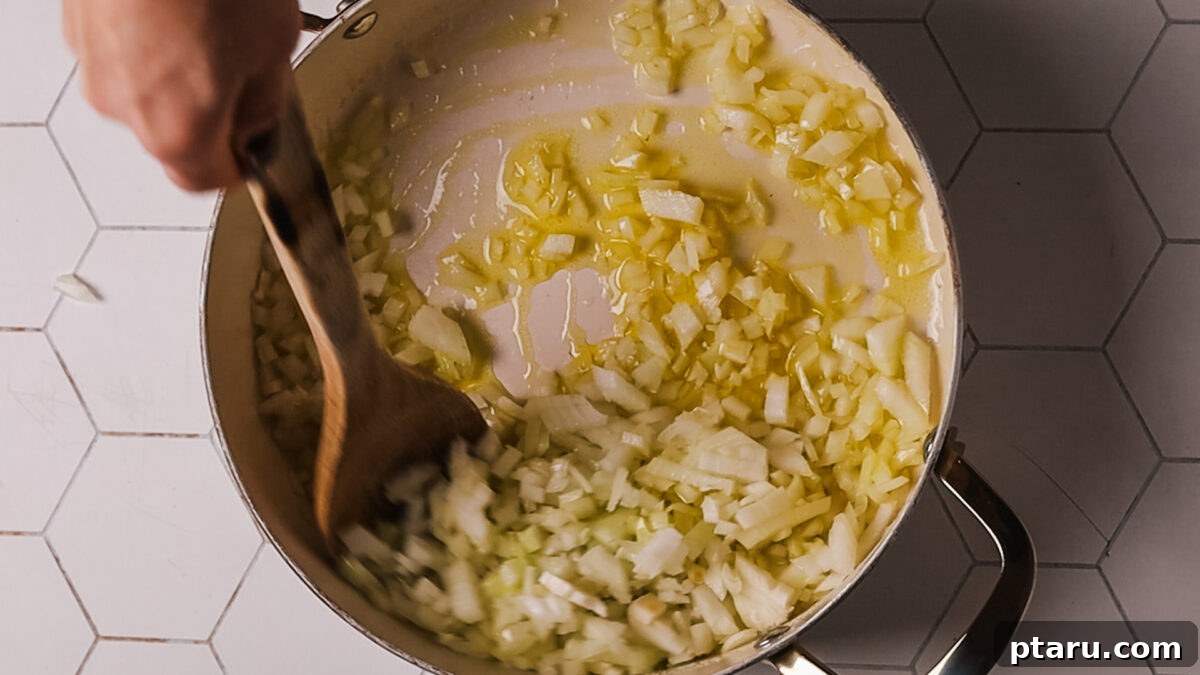 The Secret to Irresistible Meatballs 5 Sautéing chopped onion and garlic in olive oil.