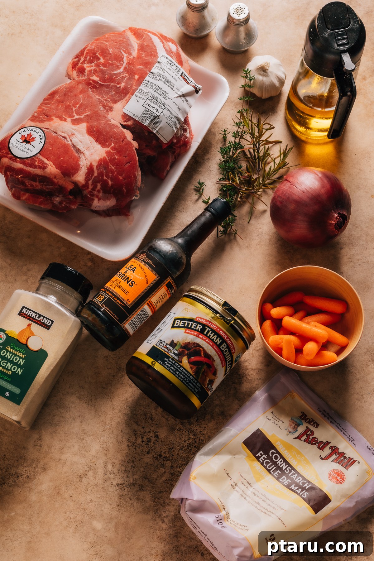 Hearty Dutch Oven Braised Beef 3 Ingredients for Instant Pot Roast Beef laid out on a table: beef, carrots, potatoes, onion, garlic, herbs, broth, and wine.
