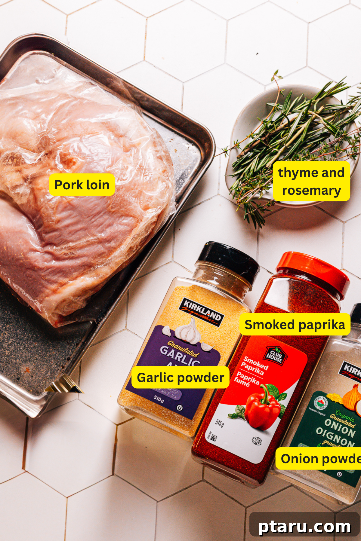 Air Fryer Pork Loin Perfection 3 Collection of ingredients for Air Fryer Pork Loin, including seasonings and raw pork.