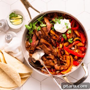 Beef Fajita Recipe featuring a vibrant, sizzling skillet of steak and vegetables