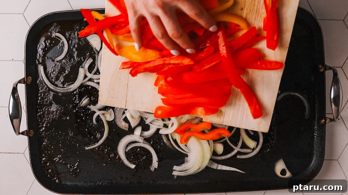 The Ultimate Recipe for Succulent Beef Fajitas 8 A chef chopping colorful bell peppers and onions uniformly for fajitas.
