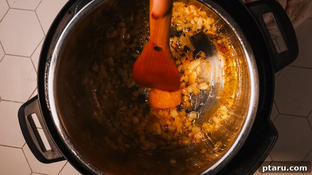 Creamy Instant Pot Potato Soup Ready in Minutes 6 dicing onion in pot