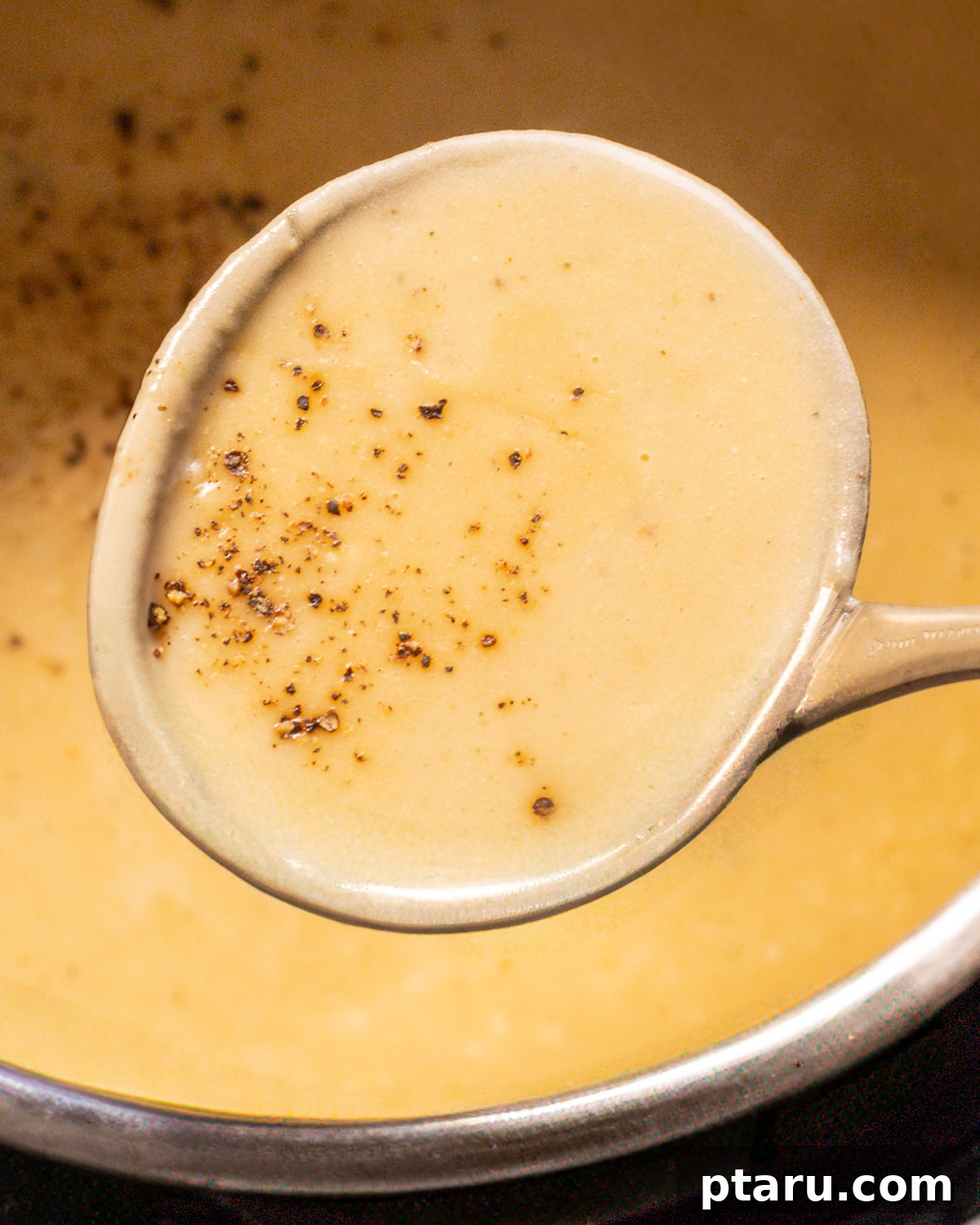 Creamy Instant Pot Potato Soup Ready in Minutes 10 close up of Instant Pot Potato Soup with bacon and chives