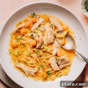 Crockpot Chicken Noodle Soup served in a comforting bowl.