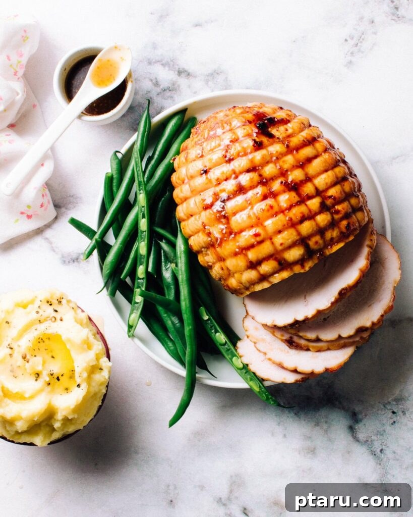 Over 60 Irresistible Recipes for Your Easter Feast 24 Maple Butter Glazed Roasted Turkey Breast, golden and inviting.