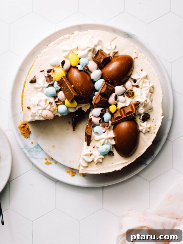 Over 60 Irresistible Recipes for Your Easter Feast 44 Festive Easter cheesecake topped with colorful Cadbury mini eggs.