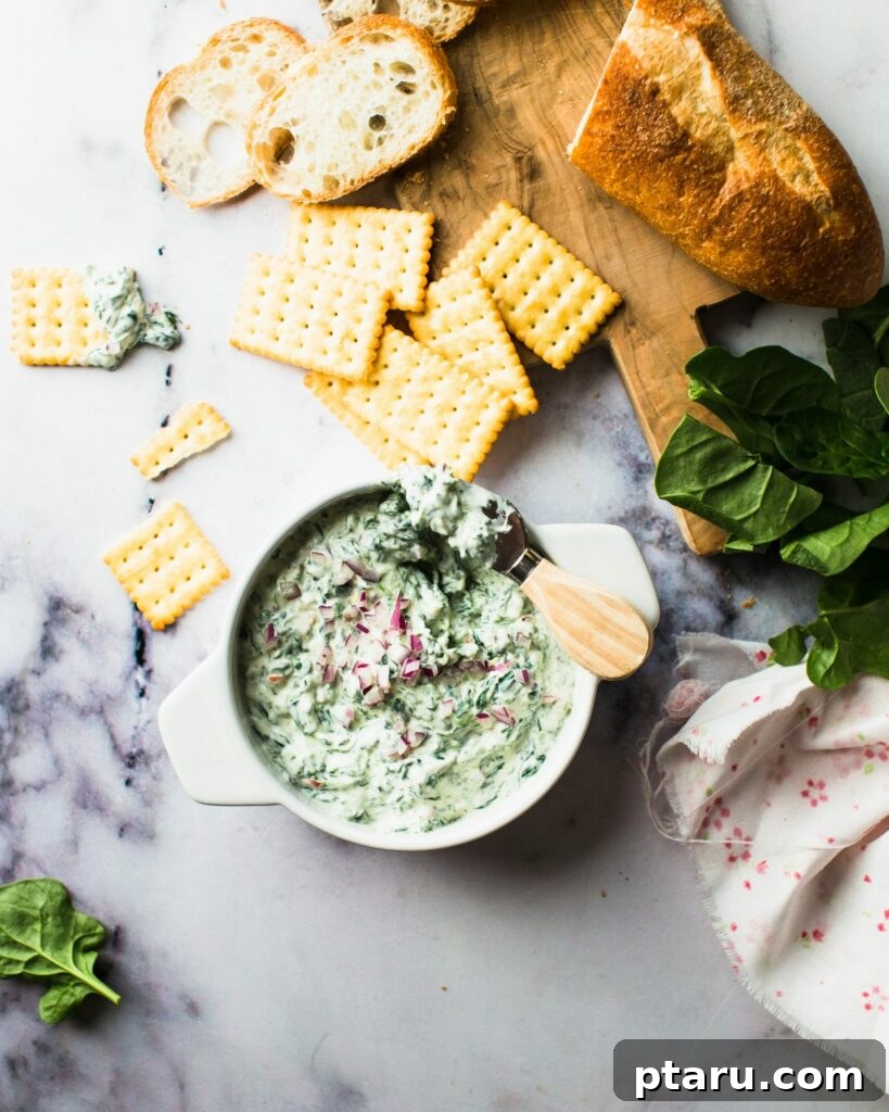 Over 60 Irresistible Recipes for Your Easter Feast 6 Creamy Spinach dip served with an assortment of crackers.