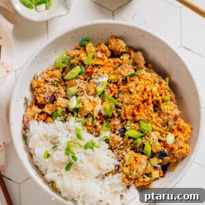 Egg roll in a bowl recipe served with rice.