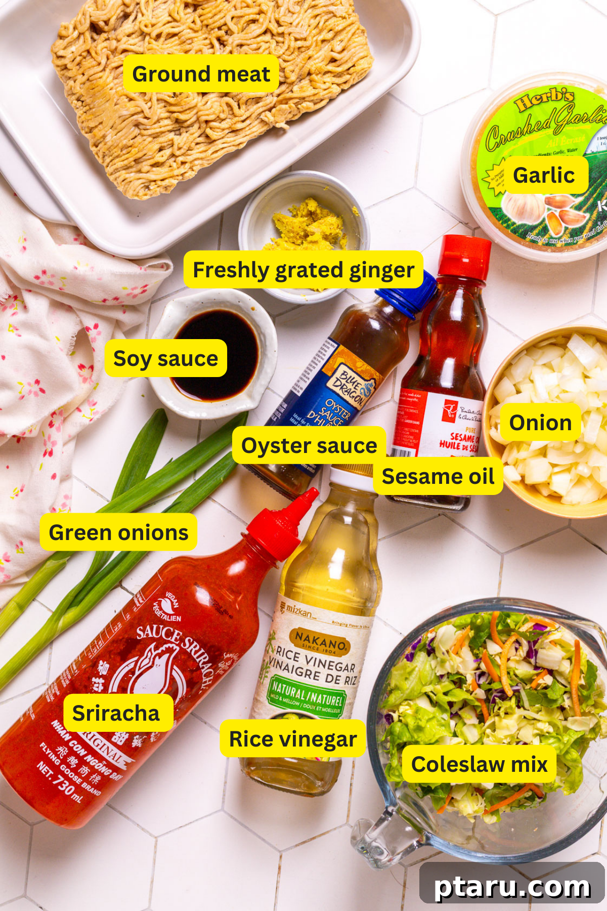 Quick Fix Egg Roll Bowl 3 Collection of fresh ingredients for Egg Roll in a Bowl: ground chicken, sesame oil, neutral oil, salt, pepper, onion, garlic, ginger, soy sauce, rice vinegar, oyster sauce, coleslaw mix, green onions.