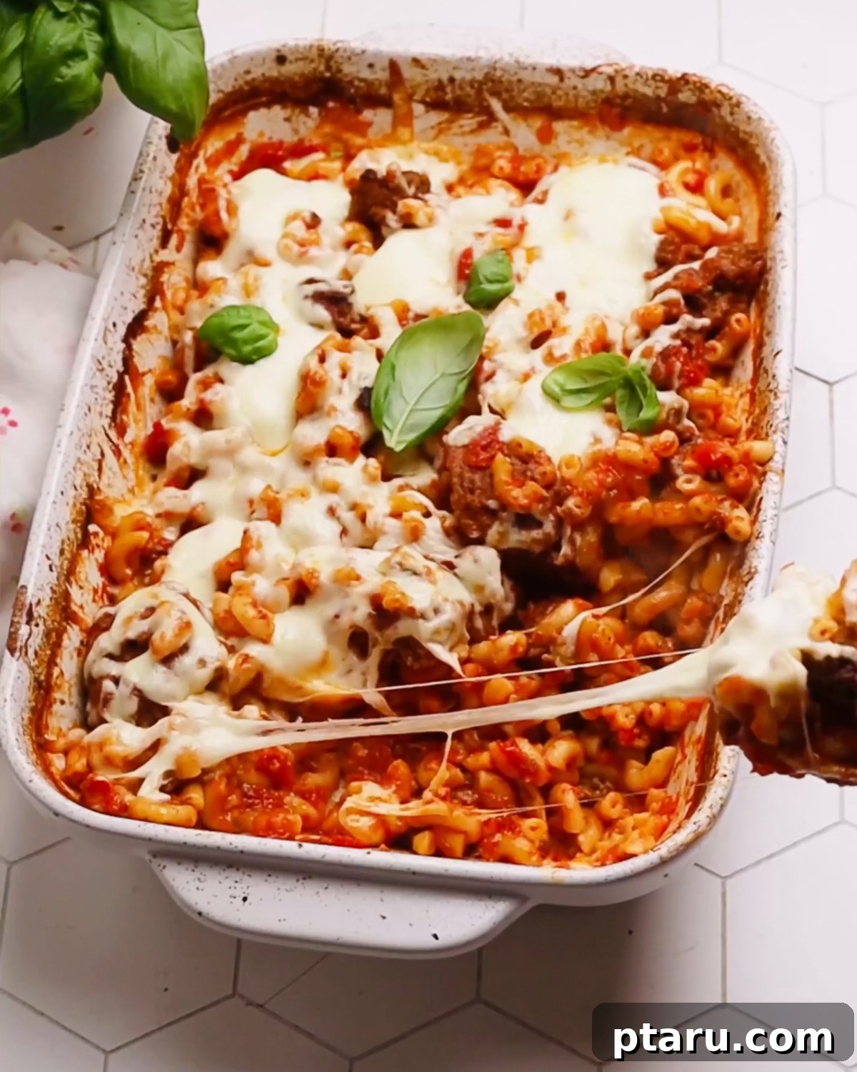 Classic Comfort Hamburger Bake 2 Delicious and easy Hamburger Casserole with ground beef and melted mozzarella cheese, ready to be served from a baking dish.