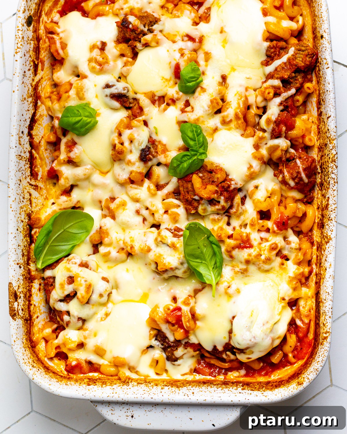 Classic Comfort Hamburger Bake 9 A large baking dish filled with freshly baked Hamburger Casserole, showcasing its golden crust and bubbly cheese, ready for serving.