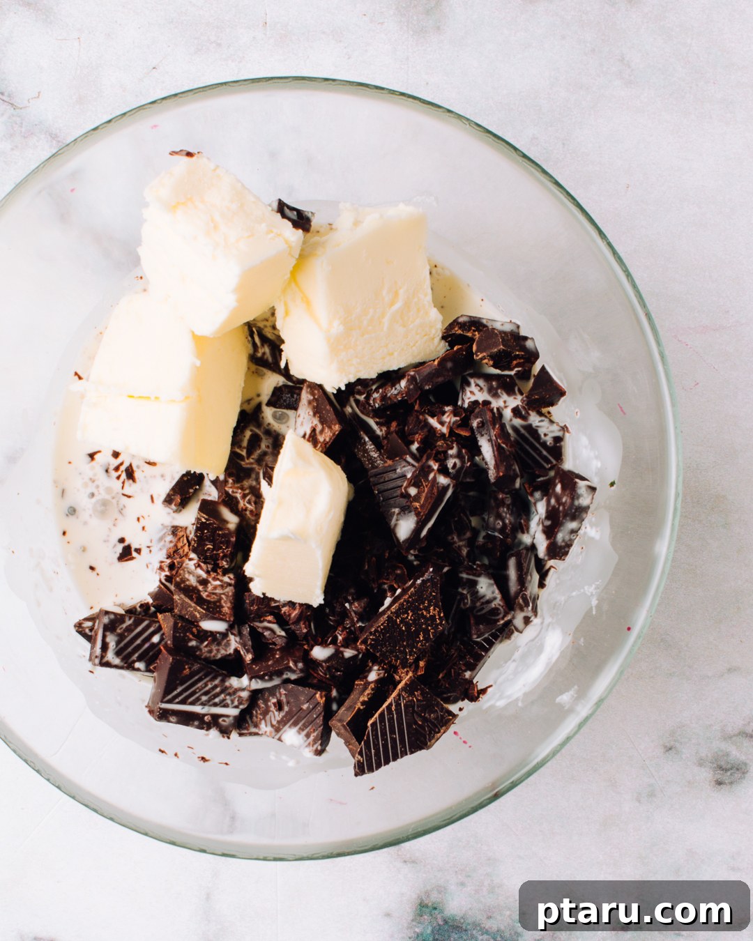 Decadent Three Ingredient Chocolate Truffles 3 Three key ingredients for chocolate truffles: chopped chocolate, heavy cream, and butter.