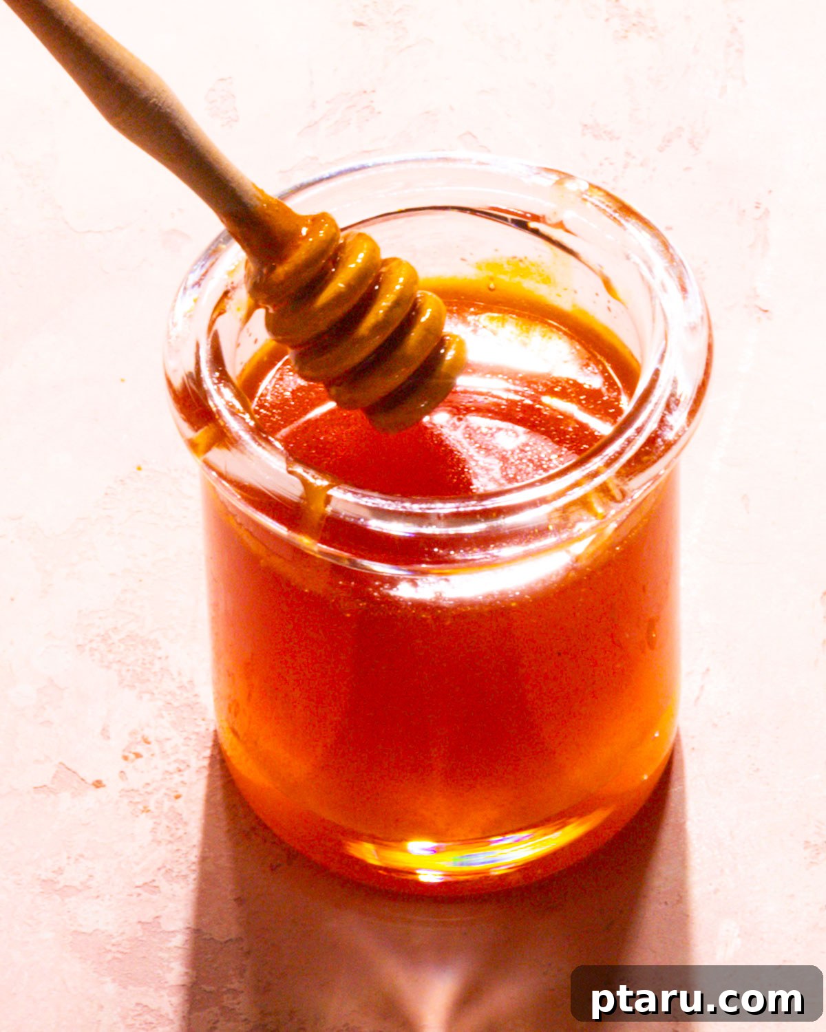 Sweet Heat Honey 6 Hot Honey Sauce in a bowl with a spoon