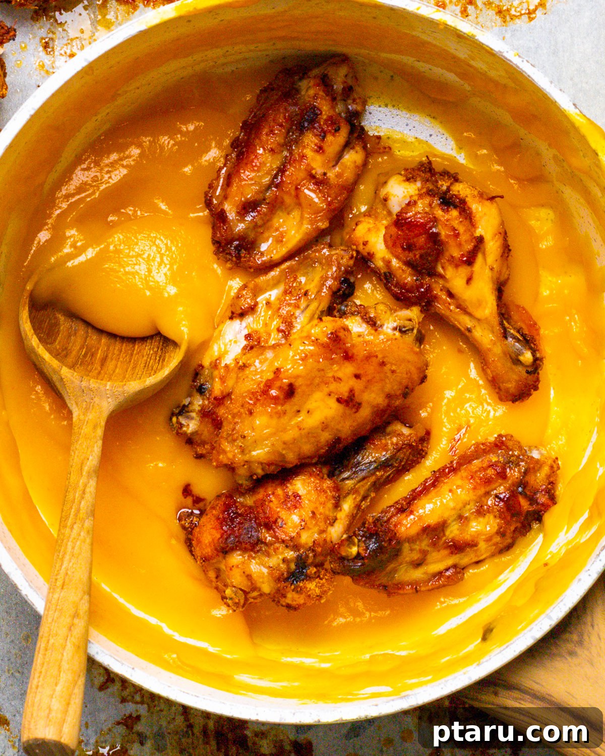 Tropical Fire Wings 2 Crispy Baked Mango Habanero Wings on a platter