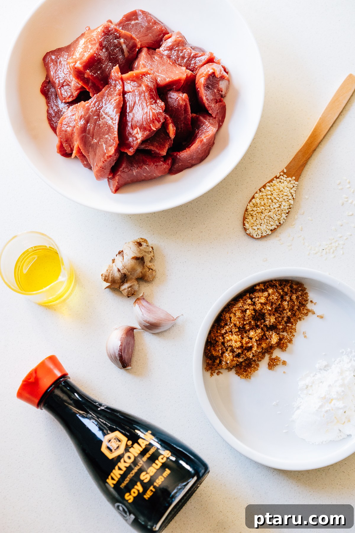 Sweet and Savory Teriyaki Beef 3 All the ingredients needed to prepare a Beef Teriyaki dish, neatly arranged on a counter.