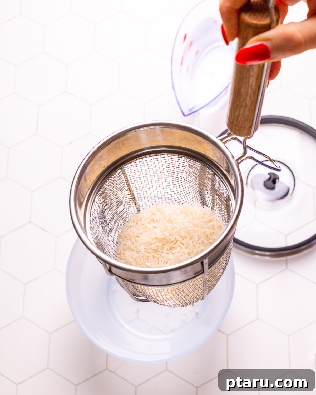 Easy Fluffy Microwave Rice 5 Step 1: Rinsing rice in a fine-mesh strainer.