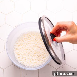 Easy Fluffy Microwave Rice 9 Microwave rice in a bowl.