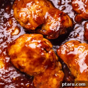 Sweet and Savory Teriyaki Chicken Marinade 7 Teriyaki Chicken Marinade on chicken thighs in a pan.