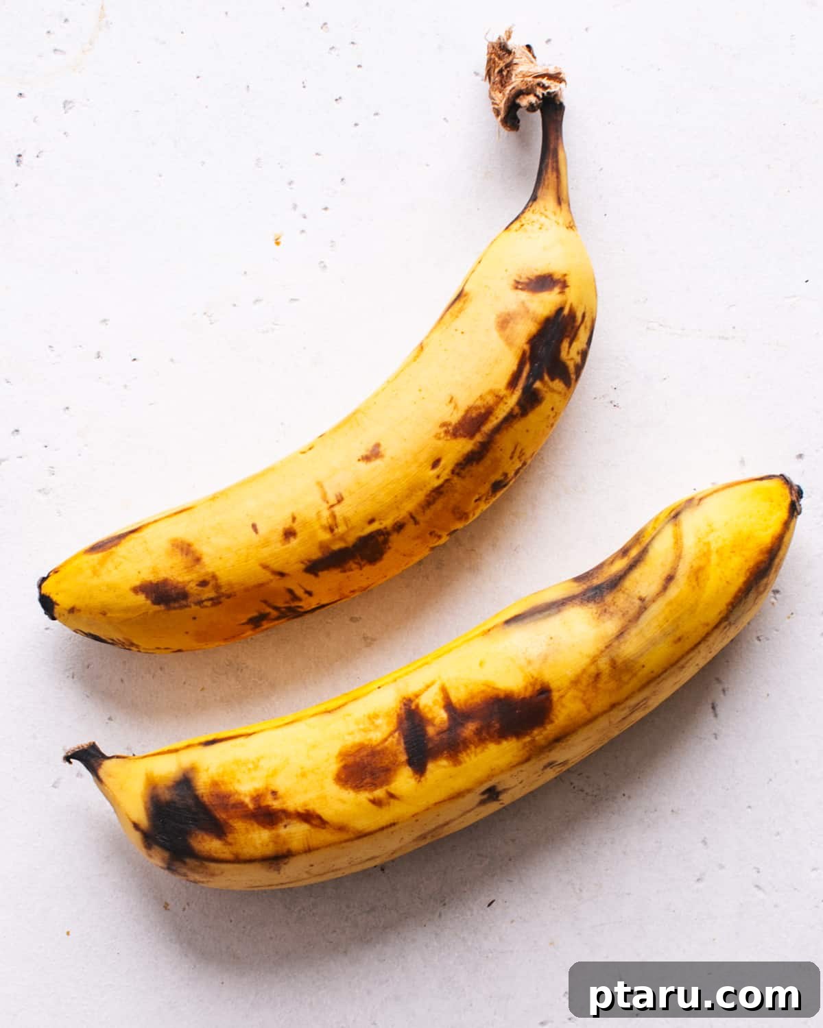 Soft and Moist Pumpkin Banana Bread 4 Ripe bananas with brown spots, ideal for baking pumpkin banana bread.
