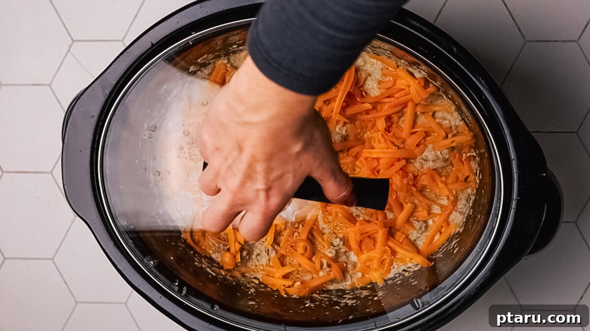 Seriously Addictive Ranch Chicken 8 Step 5: Shred chicken in the pot.