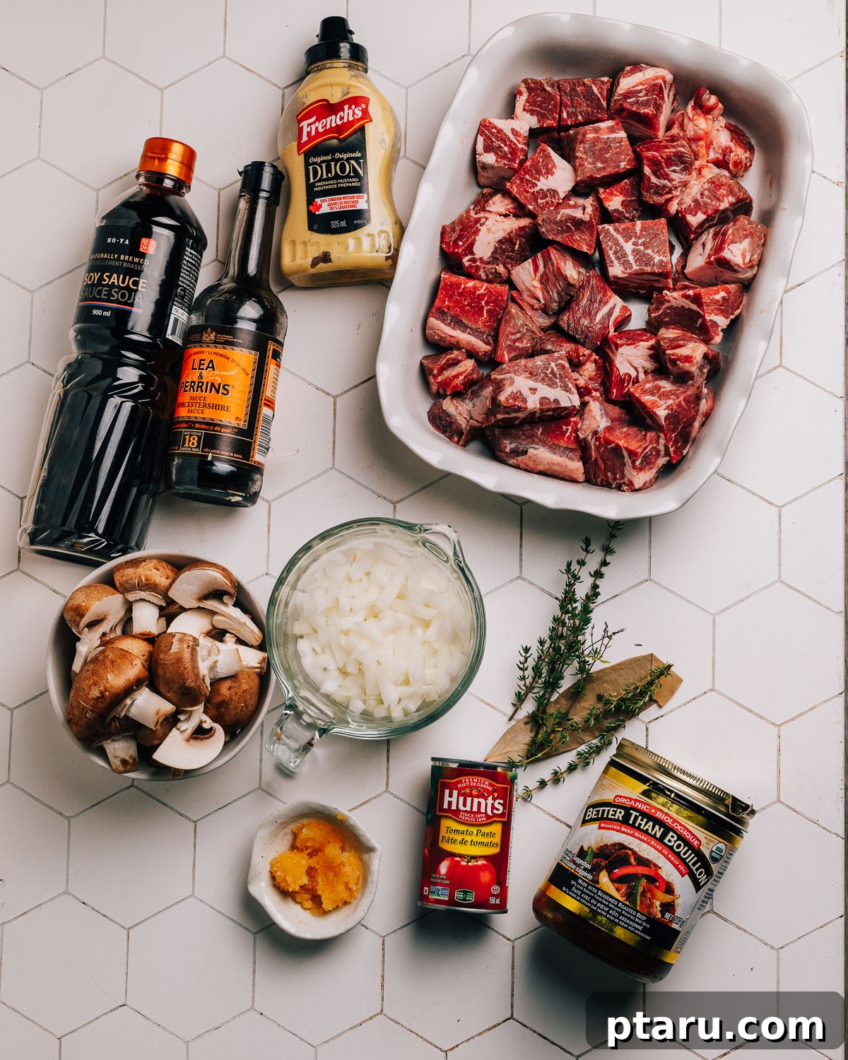 Melt-in-Your-Mouth Slow Cooker Beef Tips and Gravy 3 Ingredients laid out for Crockpot Beef Tips recipe including beef, mushrooms, onions, and various seasonings.