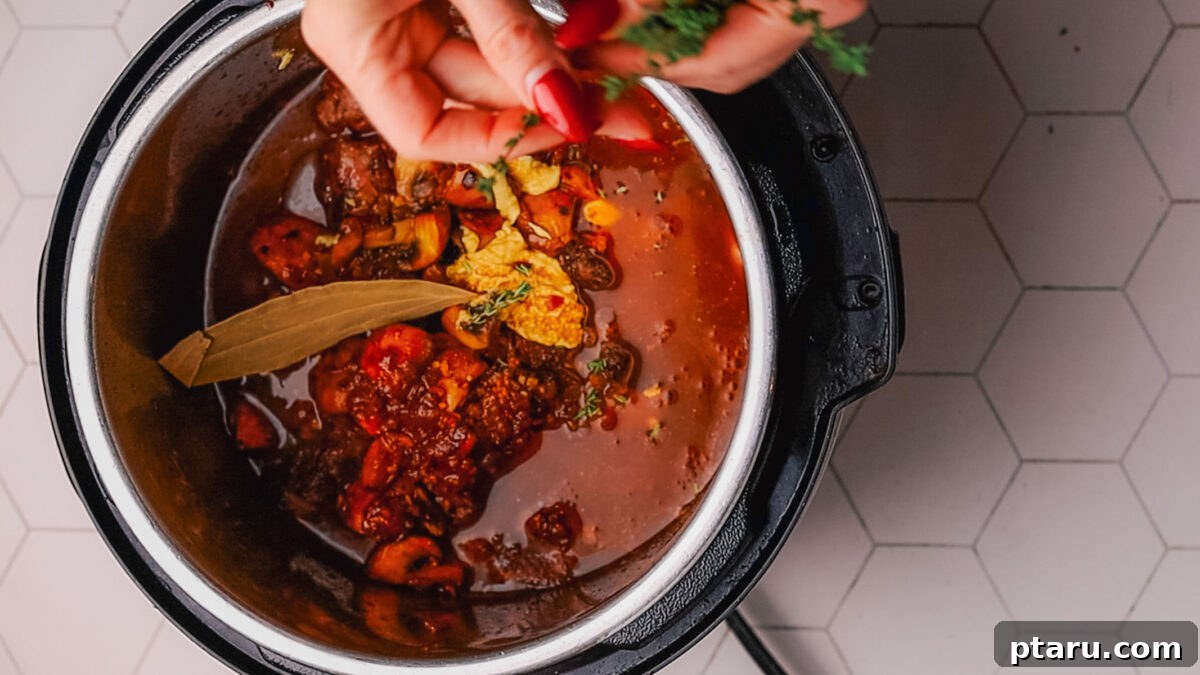 Melt-in-Your-Mouth Slow Cooker Beef Tips and Gravy 7 Step 4: All ingredients transferred to the slow cooker, ready for long, gentle simmering.