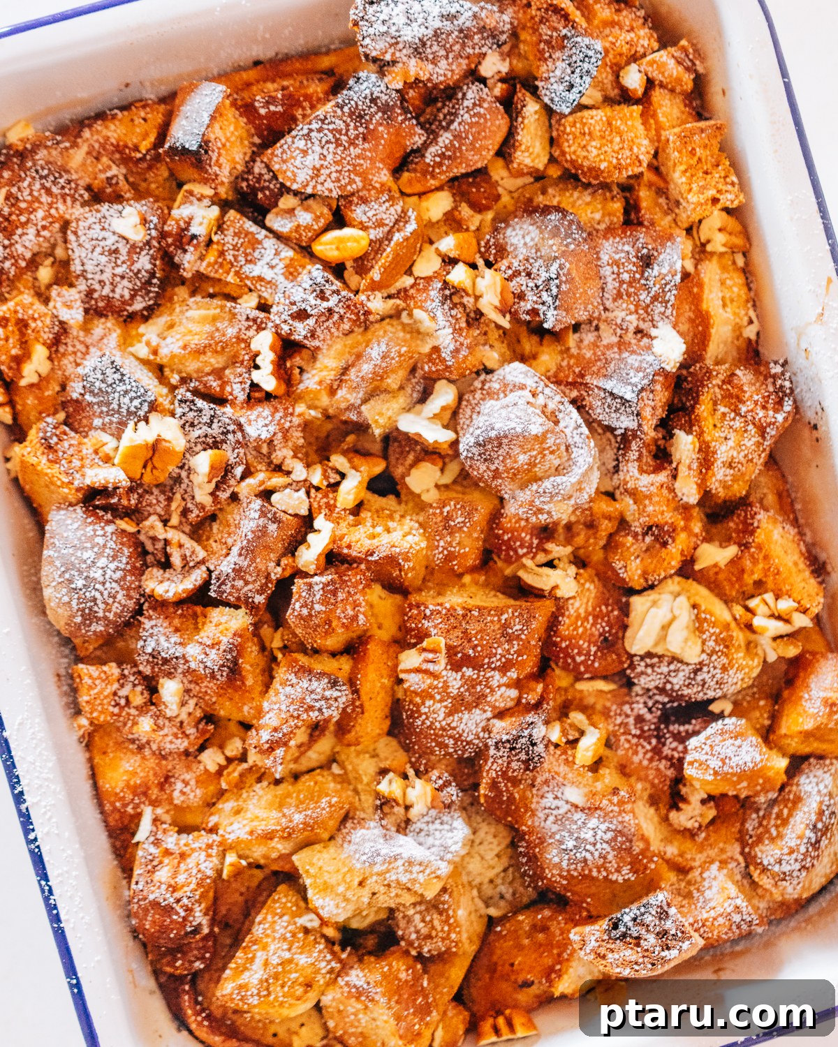 Overnight French Toast Bake for Easy Mornings 6 Step 3: Overnight French toast casserole soaking in a baking dish, ready for refrigeration.