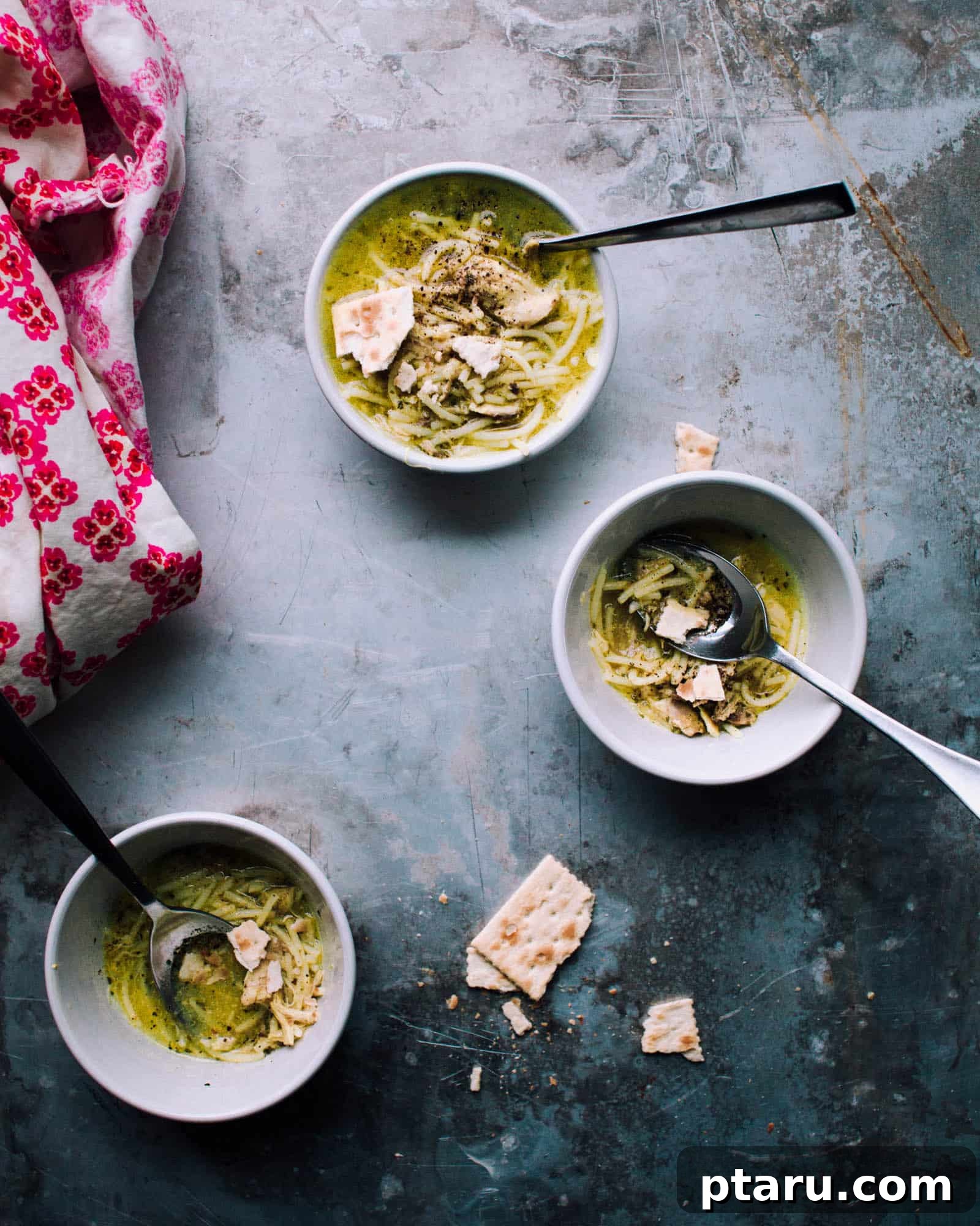 Golden Turmeric Chicken Elixir 2 Glowing Turmeric Chicken Noodle Soup Recipe - A golden, comforting soup in a bowl with chicken and noodles.